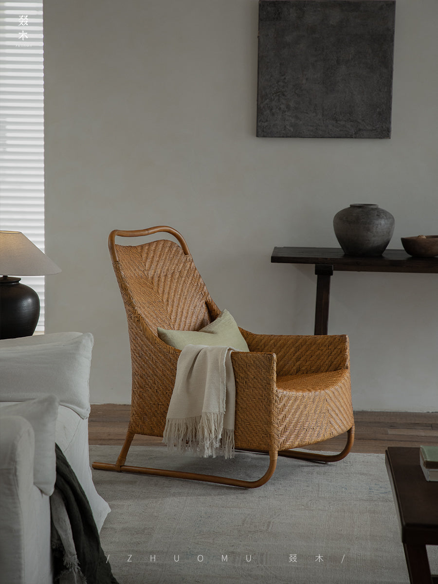 rattan lounge chair, rattan armchair, handwoven rattan furniture, natural rattan chair, relaxing chair, bohemian interior design, handcrafted rattan seating