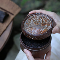 bamboo tea caddy, carved bamboo tea canister, leaf pattern tea jar, airtight tea storage, handcrafted tea container, wood engraving art, Piexlculpt Studio, artisan bamboo crafts, japanese tea box, loose leaf storage jar