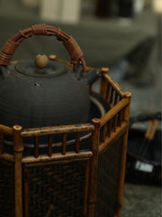 bamboo charcoal stove, tea brazier, tea heater, japanese tea stove, rattan bamboo fire pit, handcrafted tea tools, artisan tea warmer, wood engraving art, tea ceremony accessories, slow boil kettle base