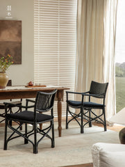 rattan dining chair, rattan armchair, black rattan chair, handwoven rattan furniture, bamboo dining chair, natural rattan seating, handcrafted rattan chair, southeast asian rattan furniture, minimalist dining chair
