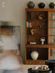 handcrafted wood cabinet, solid wood bookshelf, glass door cabinet, sliding wood cabinet, natural wood furniture, artisan wood furniture, minimalist storage cabinet, wabi-sabi furniture, boho wood shelf