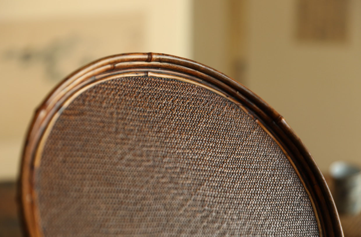 The Kosei Woven Bamboo Tray by Piexlculpt is crafted by hand from natural bamboo, offering two unique finishes: deep purple bamboo and warm brown bamboo. Its circular woven design reflects the calm