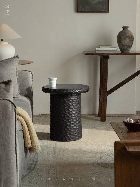 wood side table, solid wood accent table, hammered wood table, handmade wooden furniture, sculptural side table, rustic solid wood furniture, artisan carved table, textured wood decor, natural wood end table