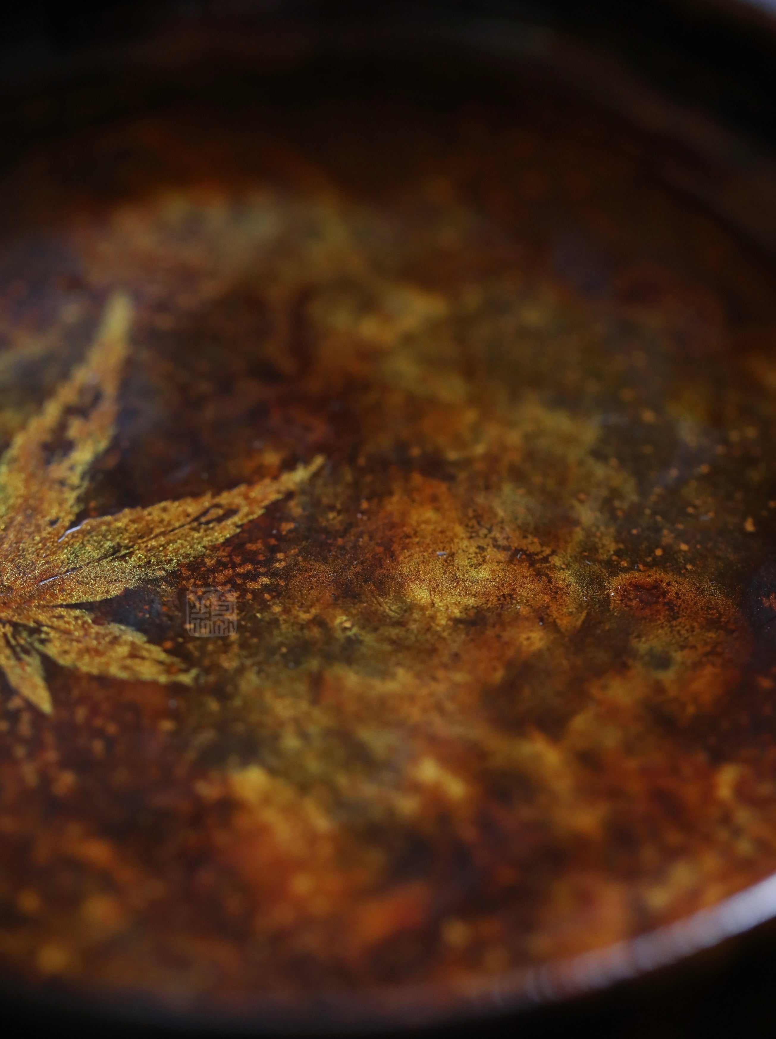 The Maple Lacquer Tray by Piexlculpt is a handcrafted tea tray made with natural lacquer and a delicate maple leaf gold-foil finish. Its handmade texture and subtle shine evoke timeless serenity, ideal for tea ceremonies