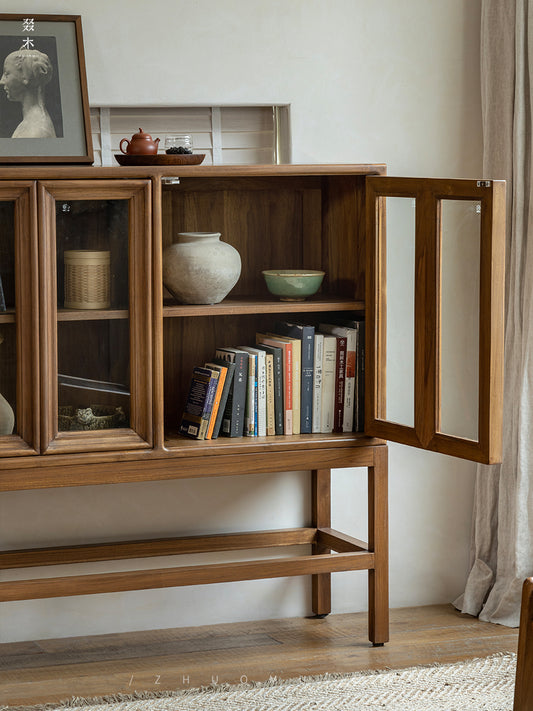 teak glass cabinet, high-leg display cabinet, solid wood showcase, handcrafted teak furniture, artisan wood cabinet, minimalist glass cabinet, wabi-sabi furniture, vintage teak display case, japanese scandi teak