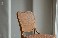 handcrafted rattan furniture, artisan bamboo chair, tropical rattan decor, natural rattan collection, handmade bamboo furniture, sustainable rattan furniture, Piexlculpt Studio, tropical home decor, custom rattan furniture, lifetime care furniture