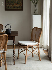 handcrafted rattan furniture, artisan bamboo chair, tropical rattan decor, natural rattan collection, handmade bamboo furniture, sustainable rattan furniture, Piexlculpt Studio, tropical home decor, custom rattan furniture, lifetime care furniture