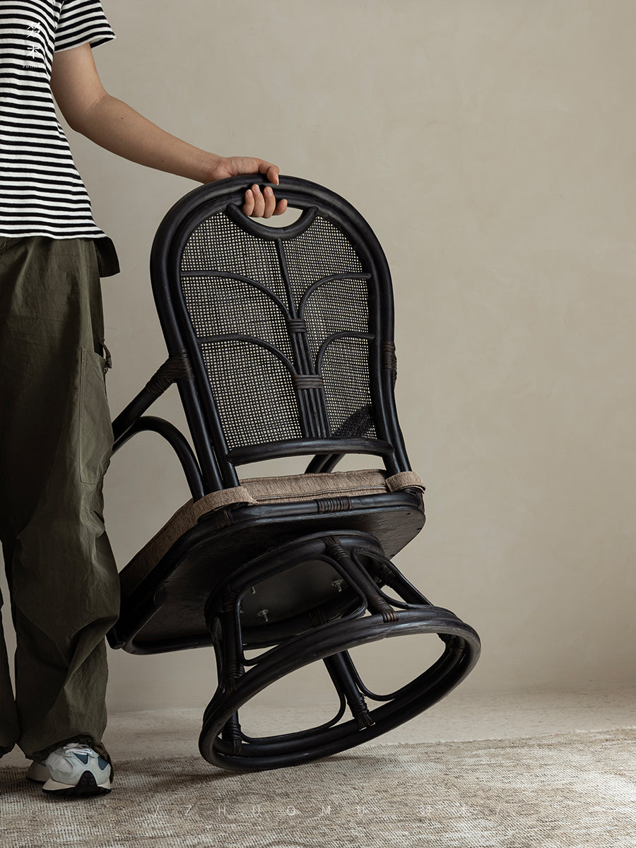 rattan swivel chair, rattan lounge chair, rotating rattan chair, handcrafted chair, natural rattan furniture, handwoven lounge seat, bohemian home decor