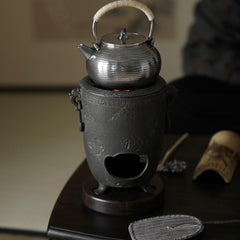 cast iron tea stove, portable tea heater, charcoal brazier, japanese tea stove, gongfu tea accessories, handmade tea tools, Piexlculpt Studio, tea ceremony heater, traditional iron brazier, wood engraving art, charcoal tea warmer