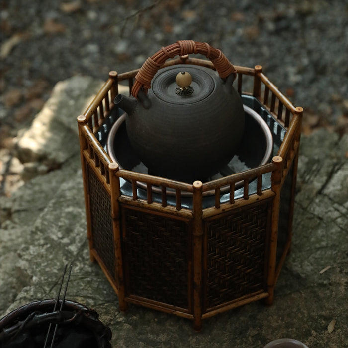 bamboo charcoal stove, tea brazier, tea heater, japanese tea stove, rattan bamboo fire pit, handcrafted tea tools, artisan tea warmer, wood engraving art, tea ceremony accessories, slow boil kettle base