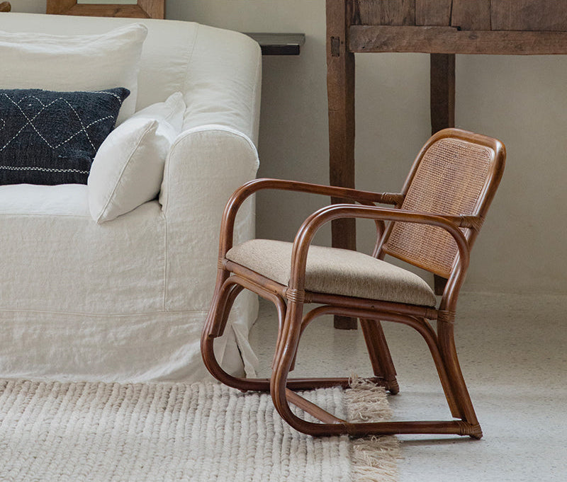 handcrafted rattan furniture, artisan bamboo chair, tropical rattan decor, natural rattan collection, handmade bamboo furniture, sustainable rattan furniture, Piexlculpt Studio, tropical home decor, custom rattan furniture, lifetime care furniture