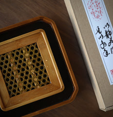 The Ryo Bamboo Tea Tray by Piexlculpt features a handcrafted dual-layer bamboo structure designed to separate dry and wet areas. Perfect for traditional tea ceremonies, it reflects the calm simplicity