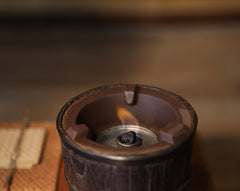 elmwood tea stove, wood fired tea heater, charcoal brazier, traditional tea stove, handcrafted tea accessories, artisan tea tools, vintage tea set, wood engraving art, Piexlculpt Studio, wooden tea warmer