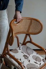 rattan swivel chair, handwoven rattan armchair, rotating rattan chair, vintage rattan seat, bamboo swivel chair, natural rattan furniture, handcrafted rattan lounge chair, tea room chair, dining rattan chair