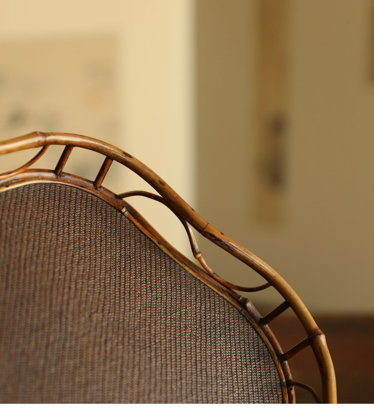 The Shirabe Bamboo Tray by Piexlculpt is a handcrafted tea tray combining purple bamboo and rattan weaving in a plum blossom frame design. Its light yet sturdy form embodies balance and grace