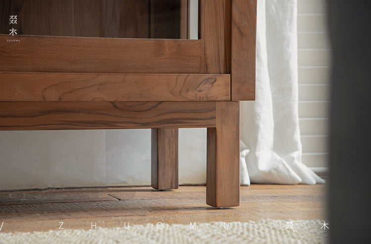 teak glass cabinet, solid wood display shelf, handcrafted teak furniture, glass door cabinet, artisan teak bookcase, minimalist wood furniture, wabi-sabi cabinet, boho wood storage, japanese scandi furniture