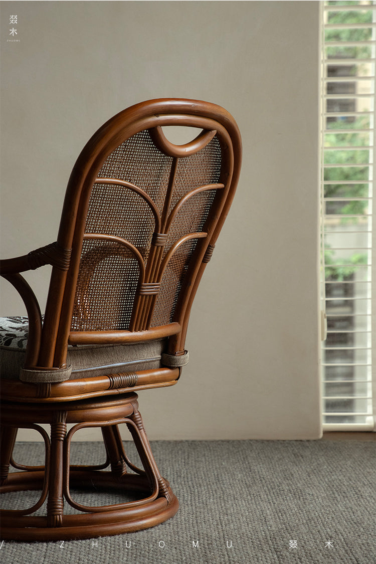 rattan swivel chair, rattan lounge chair, rotating rattan chair, handcrafted chair, natural rattan furniture, handwoven lounge seat, bohemian home decor