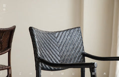 rattan dining chair, rattan armchair, black rattan chair, handwoven rattan furniture, bamboo dining chair, natural rattan seating, handcrafted rattan chair, southeast asian rattan furniture, minimalist dining chair