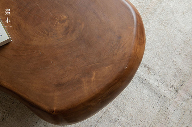 claw coffee table, solid wood coffee table, sculptural wood table, organic form table, handcrafted furniture, wabi sabi furniture, piexlculpt studio, round wooden table, low wood table, designer furniture