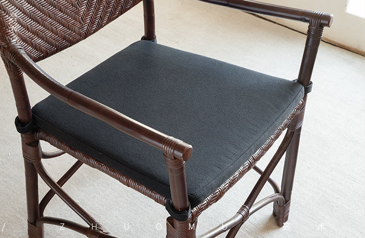 rattan dining chair, rattan armchair, black rattan chair, handwoven rattan furniture, bamboo dining chair, natural rattan seating, handcrafted rattan chair, southeast asian rattan furniture, minimalist dining chair