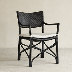 rattan dining chair, rattan armchair, black rattan chair, handwoven rattan furniture, bamboo dining chair, natural rattan seating, handcrafted rattan chair, southeast asian rattan furniture, minimalist dining chair