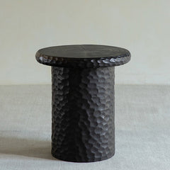 wood side table, solid wood accent table, hammered wood table, handmade wooden furniture, sculptural side table, rustic solid wood furniture, artisan carved table, textured wood decor, natural wood end table