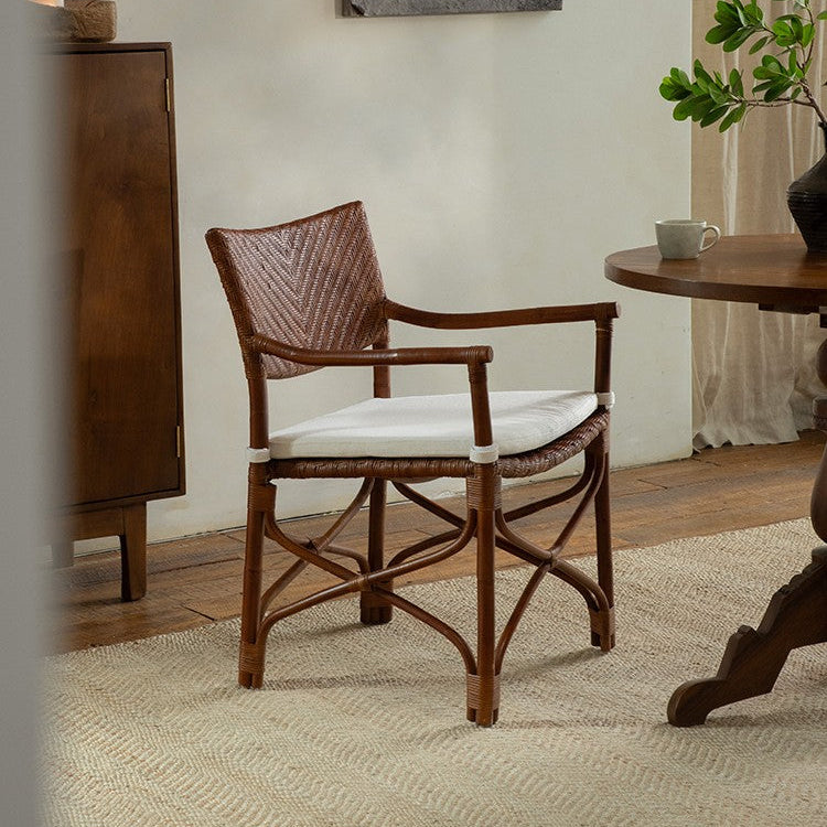 rattan dining chair, rattan armchair, black rattan chair, handwoven rattan furniture, bamboo dining chair, natural rattan seating, handcrafted rattan chair, southeast asian rattan furniture, minimalist dining chair