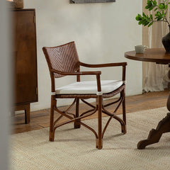 rattan dining chair, rattan armchair, black rattan chair, handwoven rattan furniture, bamboo dining chair, natural rattan seating, handcrafted rattan chair, southeast asian rattan furniture, minimalist dining chair