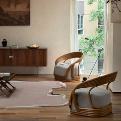 rattan lounge chair, designer rattan chair, handcrafted rattan furniture, modern accent chair, rattan armchair, handmade rattan seat, bohemian furniture, natural interior