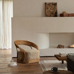 rattan lounge chair, designer rattan chair, handcrafted rattan furniture, modern accent chair, rattan armchair, handmade rattan seat, bohemian furniture, natural interior
