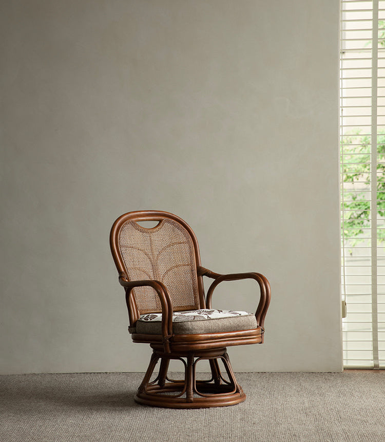 rattan swivel chair, rattan lounge chair, rotating rattan chair, handcrafted chair, natural rattan furniture, handwoven lounge seat, bohemian home decor