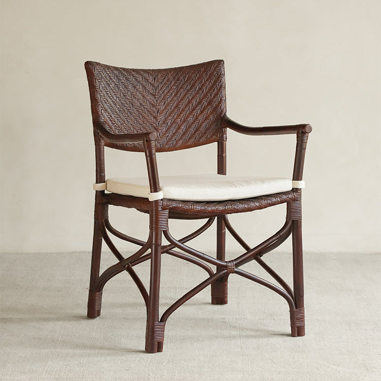 rattan dining chair, rattan armchair, black rattan chair, handwoven rattan furniture, bamboo dining chair, natural rattan seating, handcrafted rattan chair, southeast asian rattan furniture, minimalist dining chair