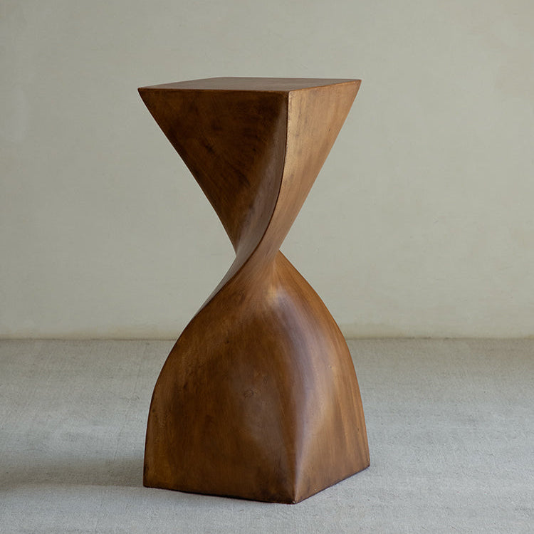 wood pedestal table, solid wood plant stand, sculptural wood side table, twist wooden table, handmade wood decor, rustic accent furniture, modern wood pedestal, artisan carved furniture, natural wood display stand