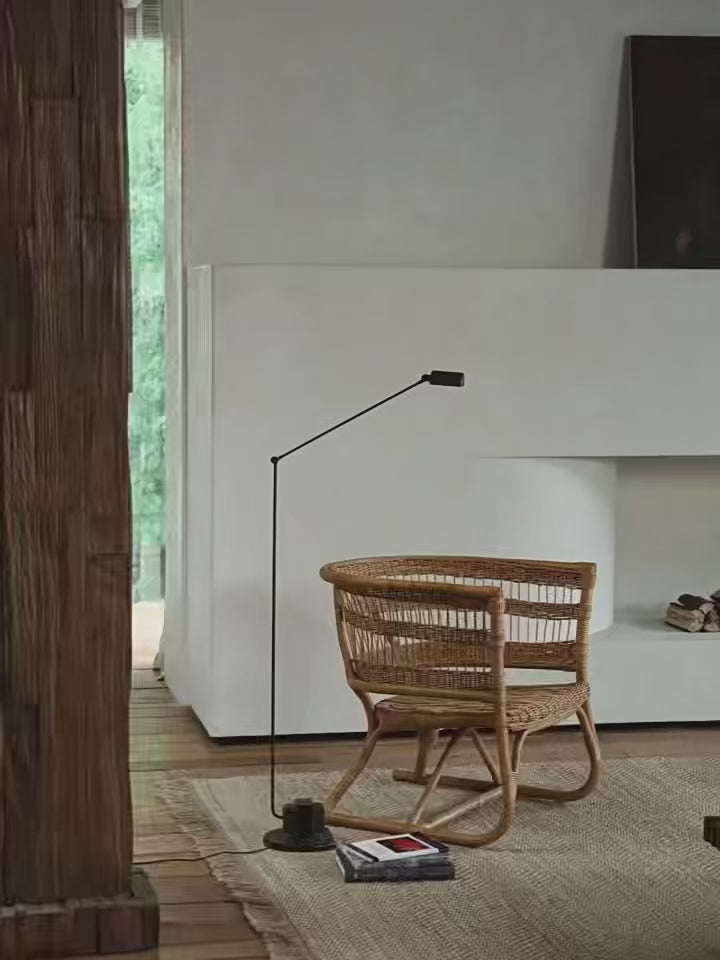 rattan armchair, rattan lounge chair, handwoven rattan furniture, natural rattan chair, outdoor rattan seating, bohemian interior design, handcrafted rattan armchair